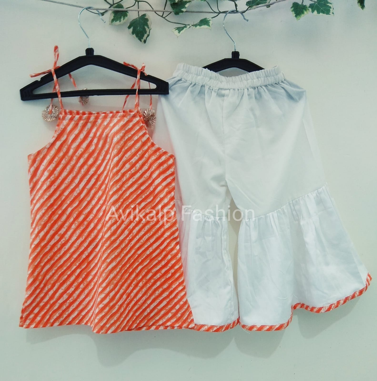 Girls' Orange Leheriya Noodle Strap Kurta & White Sharara Set